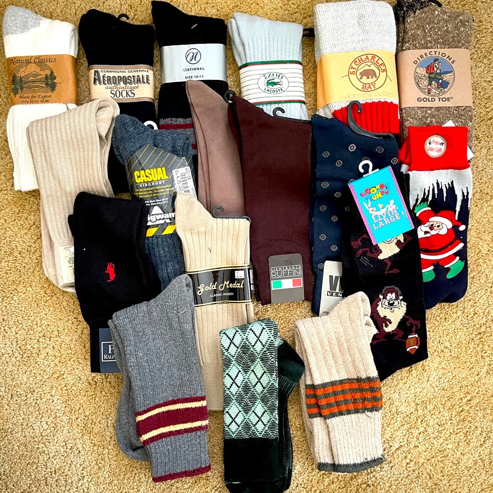 Assorted brands and colors of men’s NWT socks. Average price is $5.00 per pair.